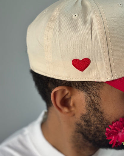 Heart & Freedom Duel-Tone Snapback with heart detail and distressed patch, vintage streetwear cap.