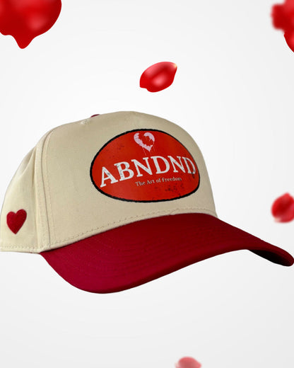 ABNDND Heart & Freedom Duel-Tone Snapback with distressed patch and heart detail.